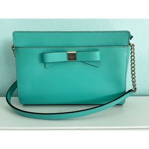 Kate Spade mint green leather cross body bag with gold hardware and bow